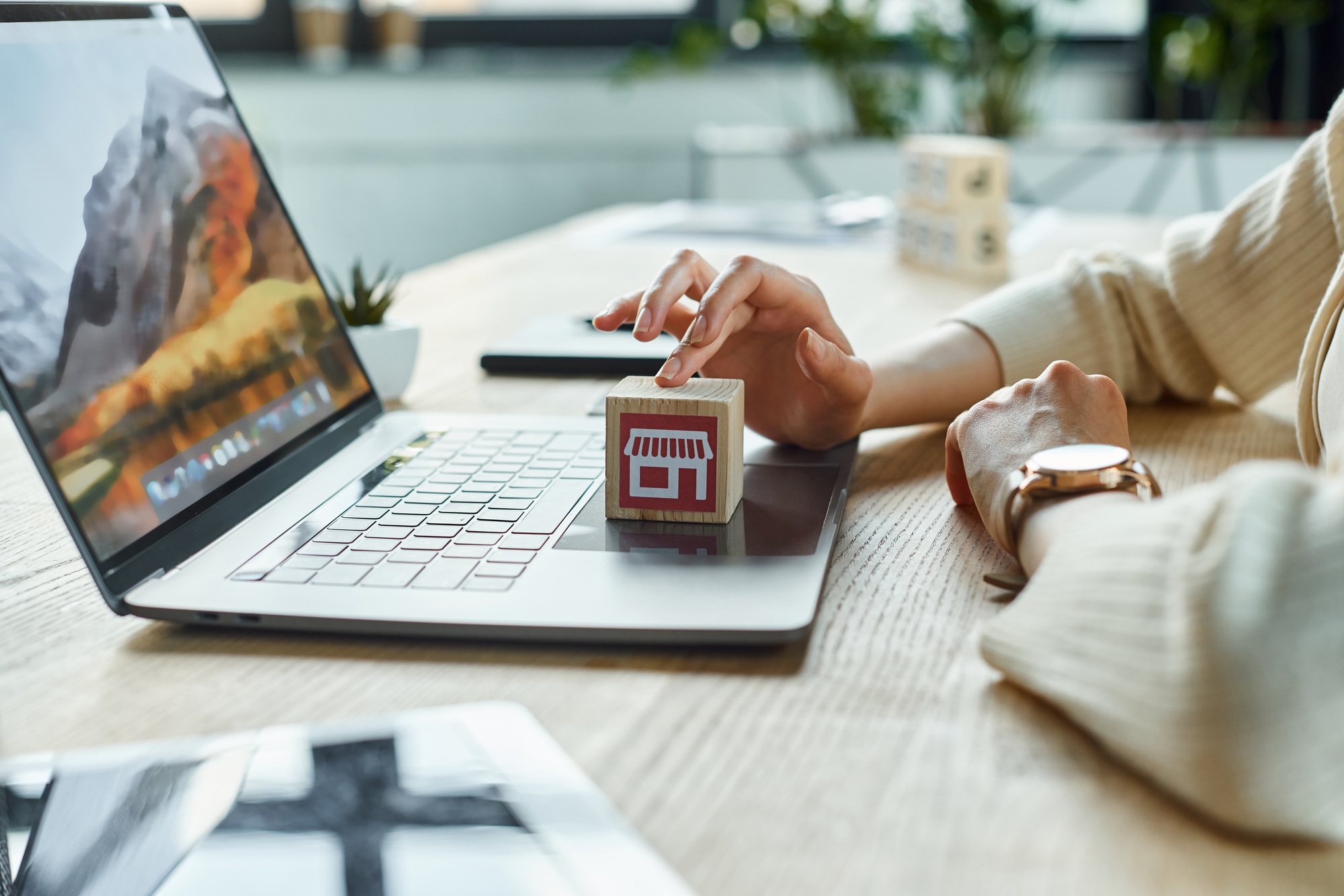 Empowered businesswoman holding mini house for franchise innovation